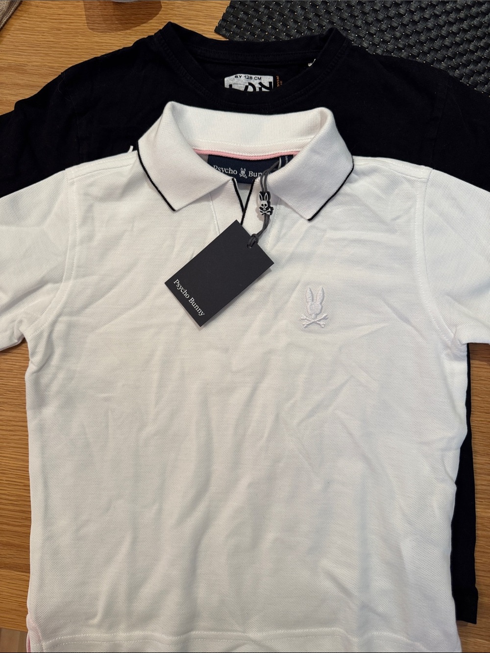 Psycho Bunny White Polo with Black Piping